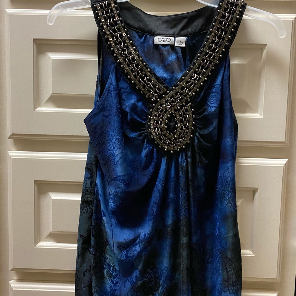 Beautiful detailed neckline blouse